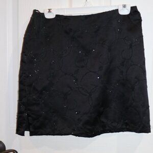 Women's MODA INTL size 14 18" long black skirt with beading
